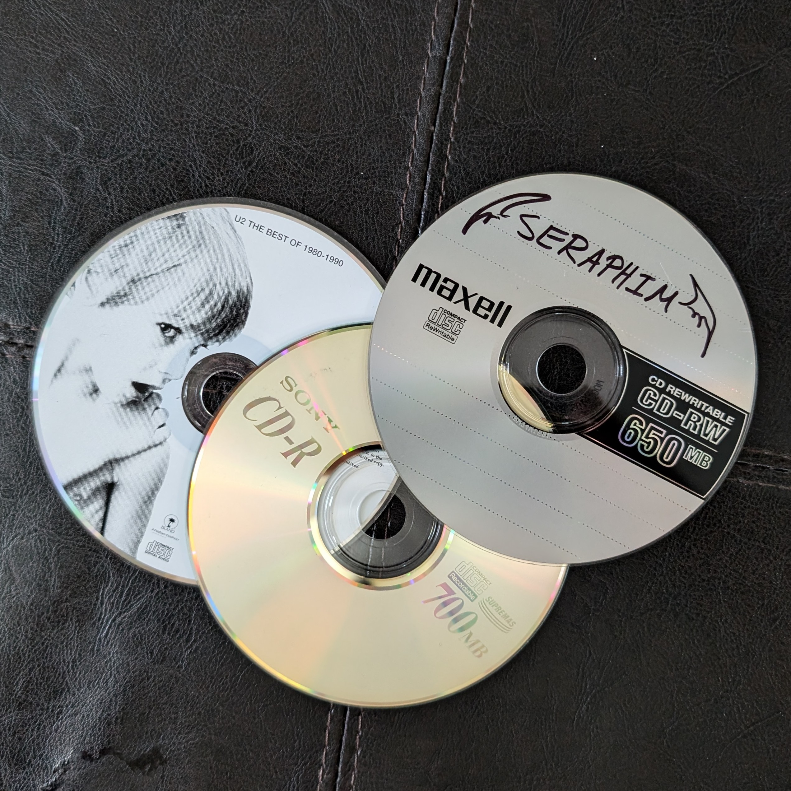 Three CDs.<br>
                Two of them are gifts from my parents and one is a CD I used to burn music into.