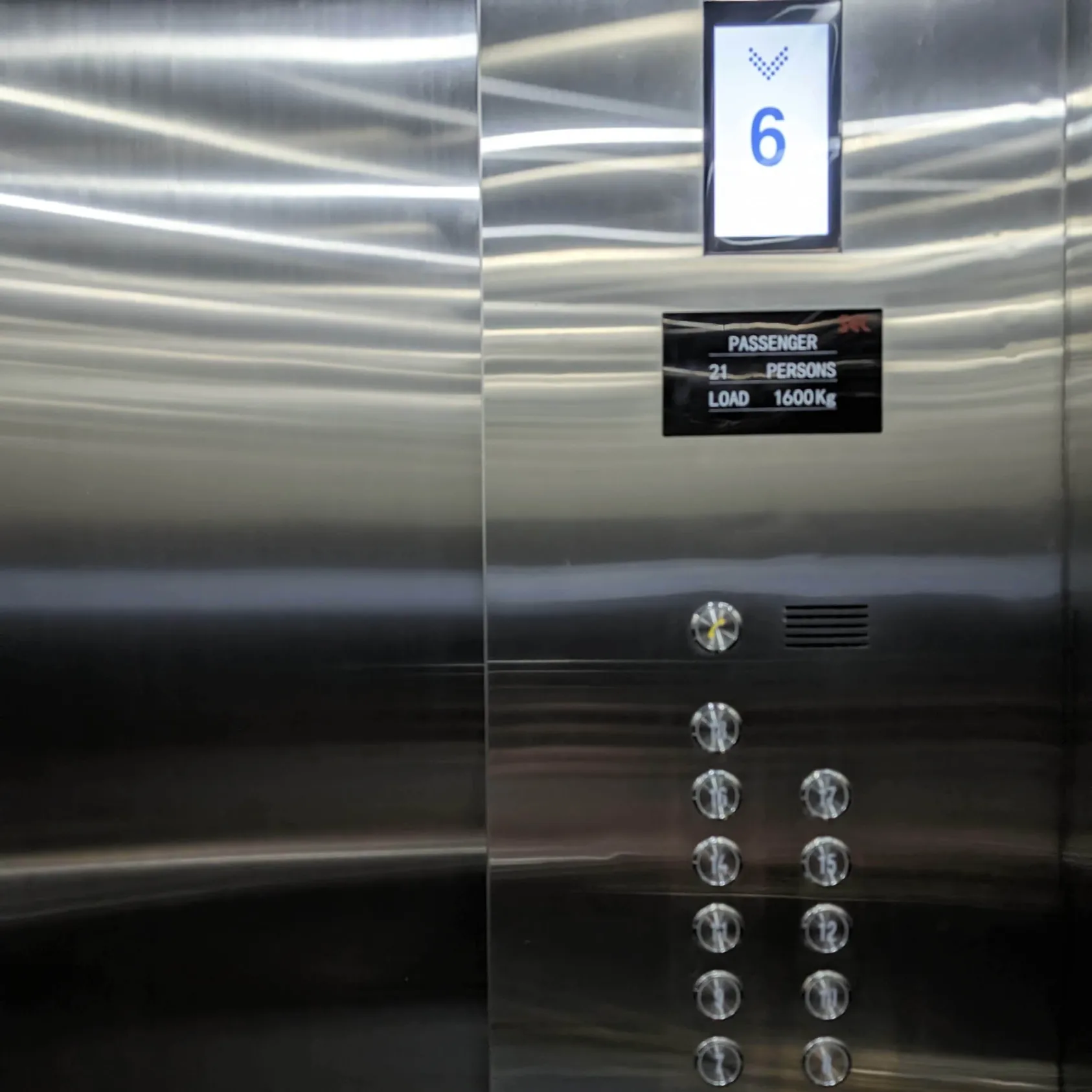Elevator beeping.