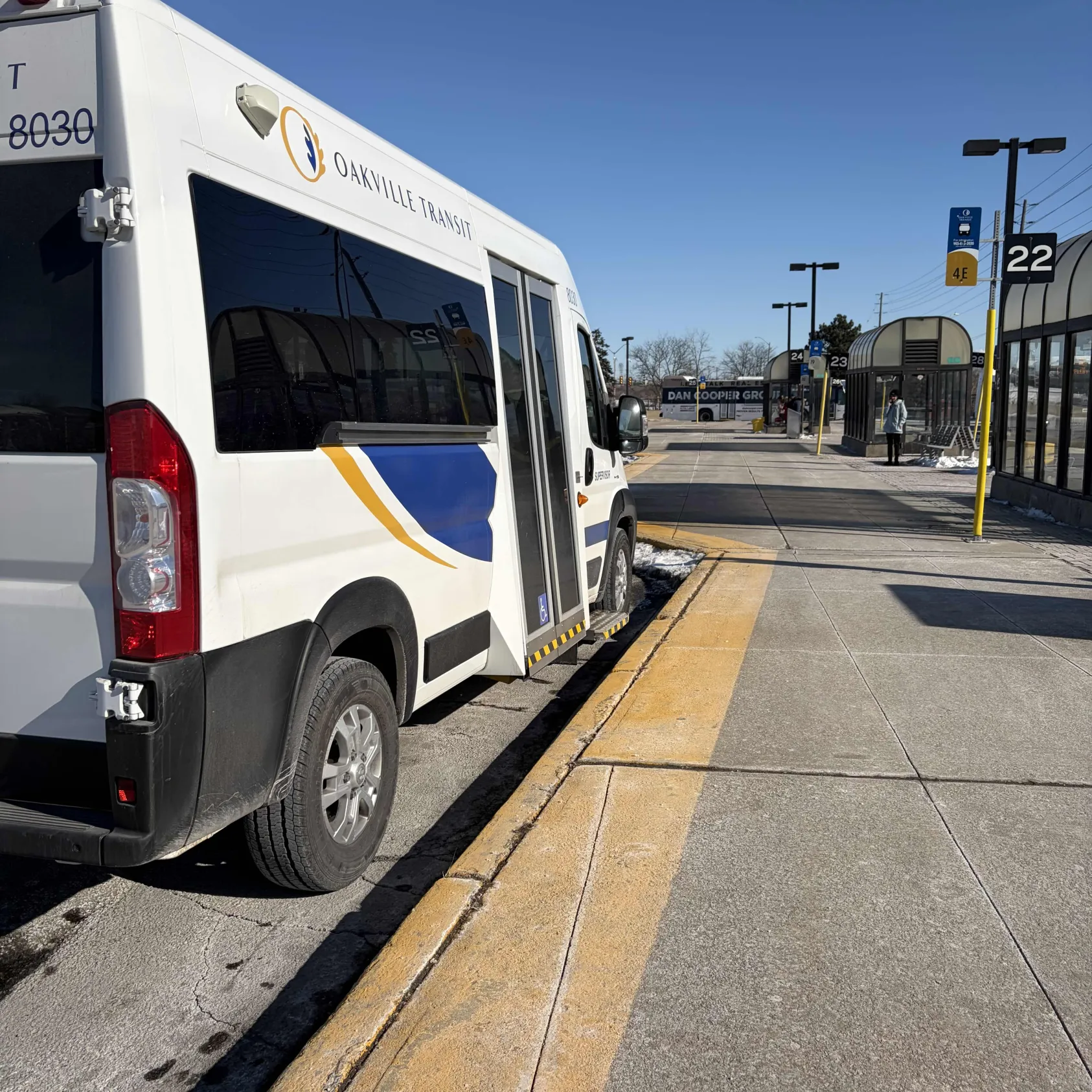 The Oakville buses hissing to lower itself for passengers to board.