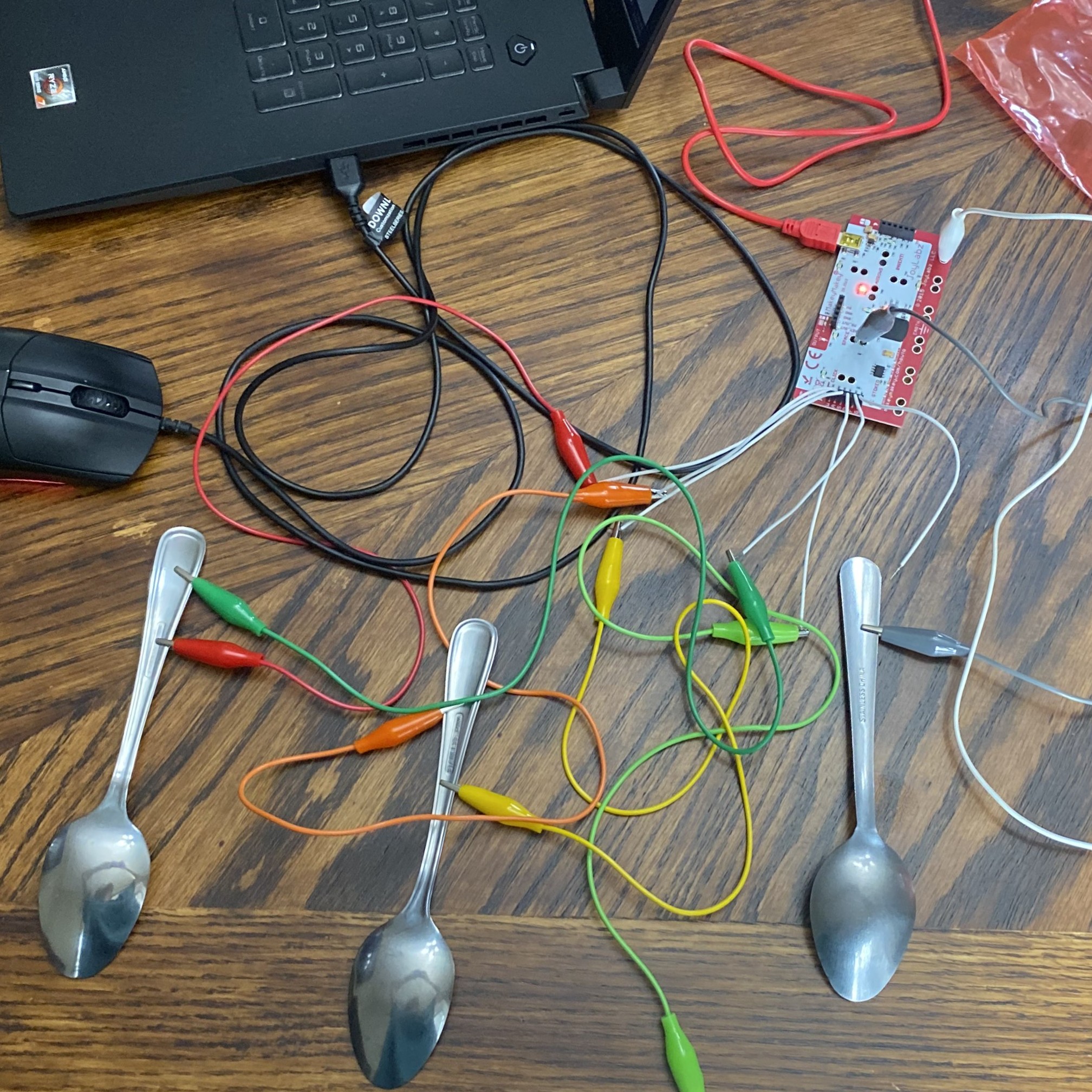 Makey Makey setup with spoons.