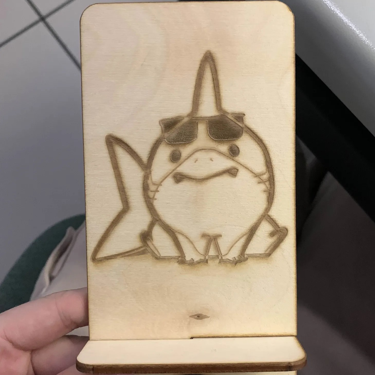 Jeff the Shark phone stand. There were some issues with overlapping strokes in Adobe Illustrator, but it worked out with revisions and the mentor's help.