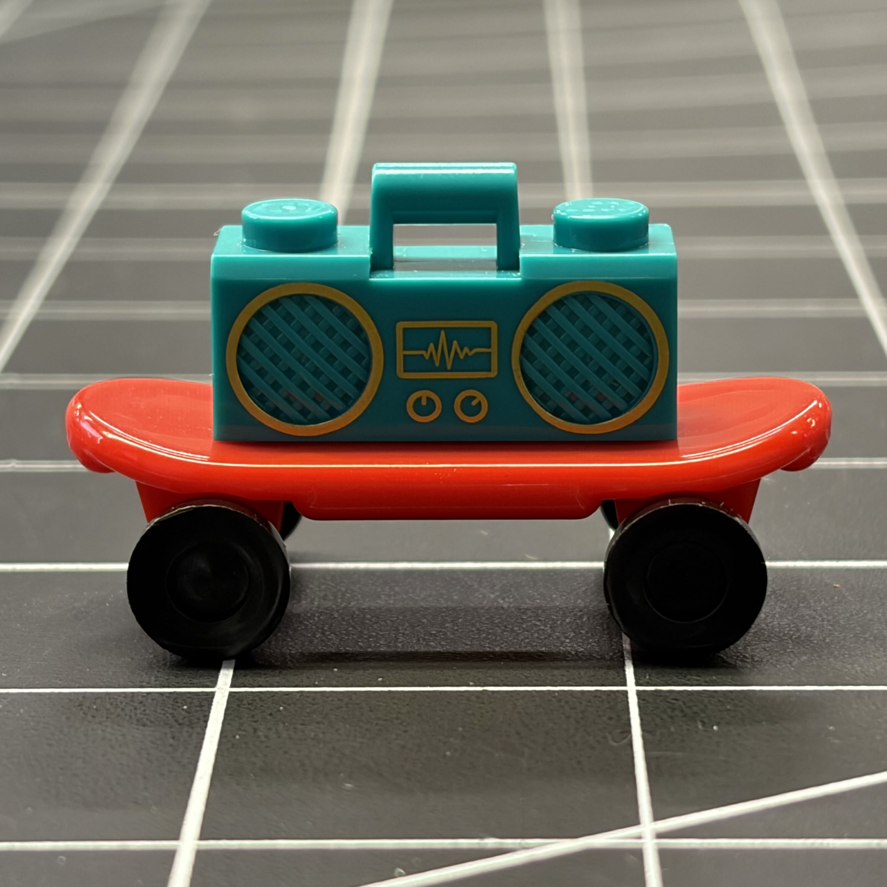 My Lego boombox and my Lego skateboard put together to represent my skater/street aesthetic growing up.